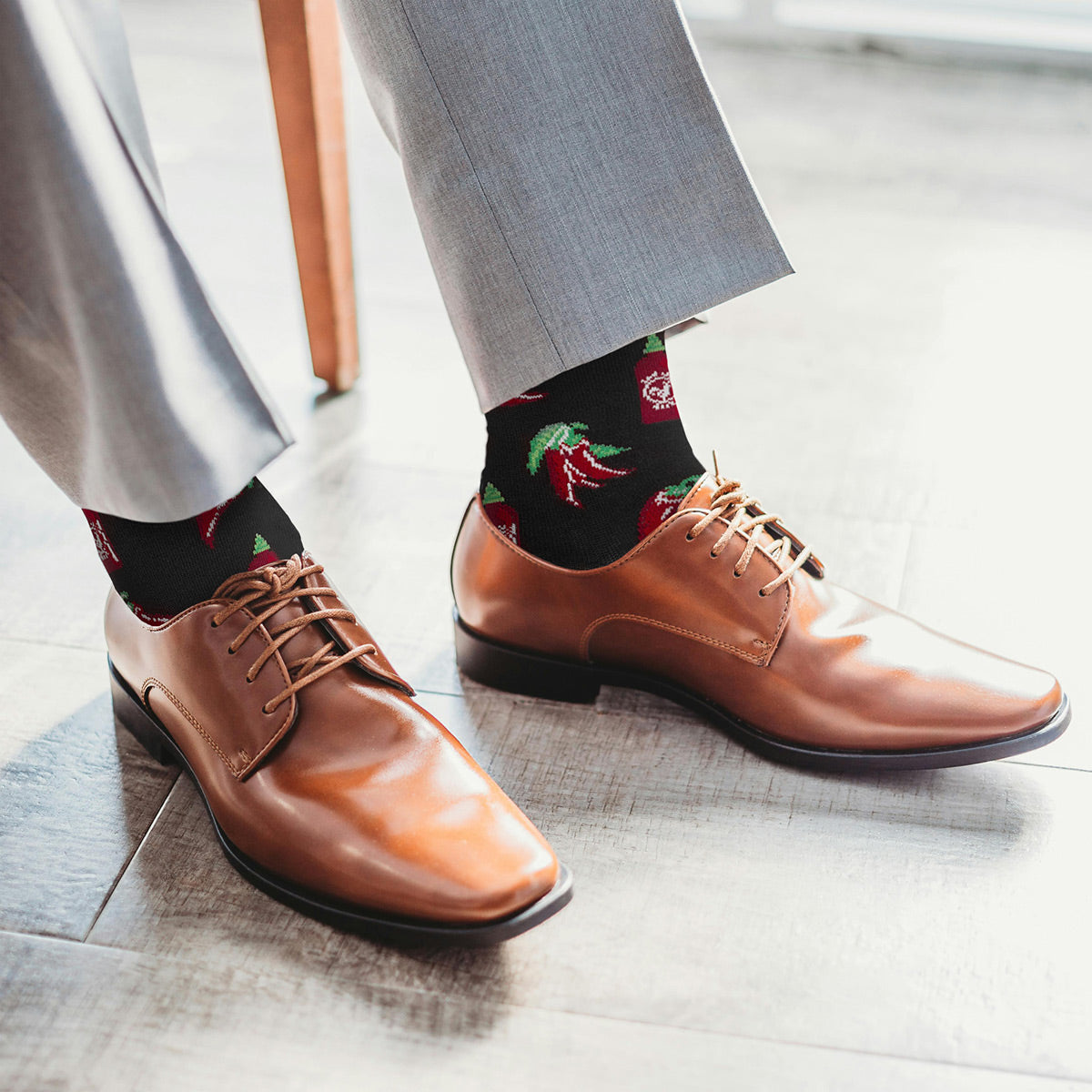 chili pepper graphic socks being worn and shown