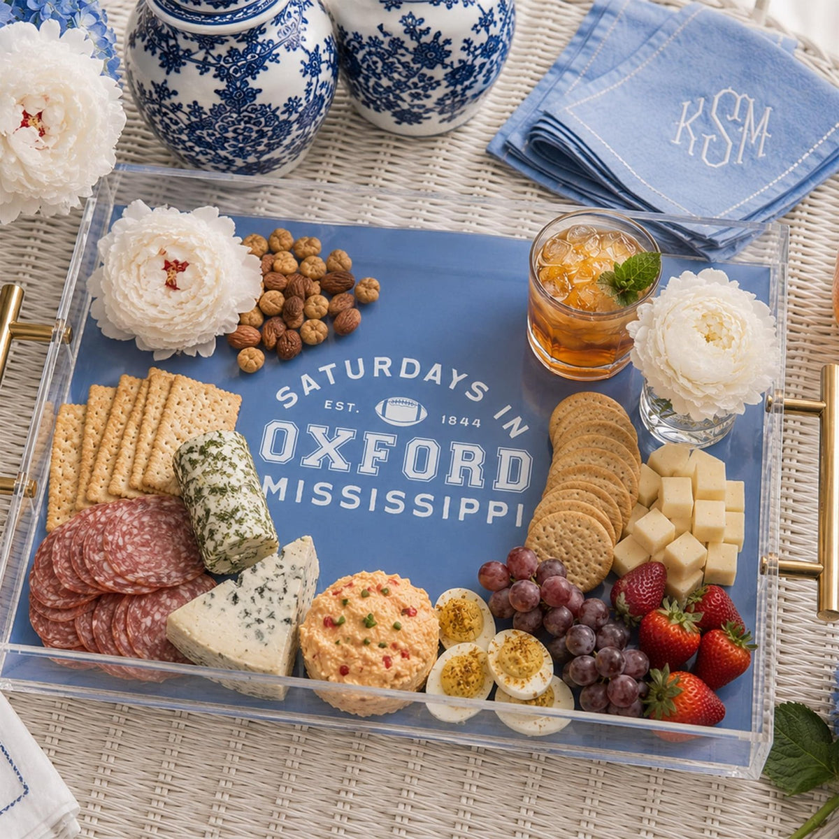 custom college football acrylic serving tray as a charcuterie board
