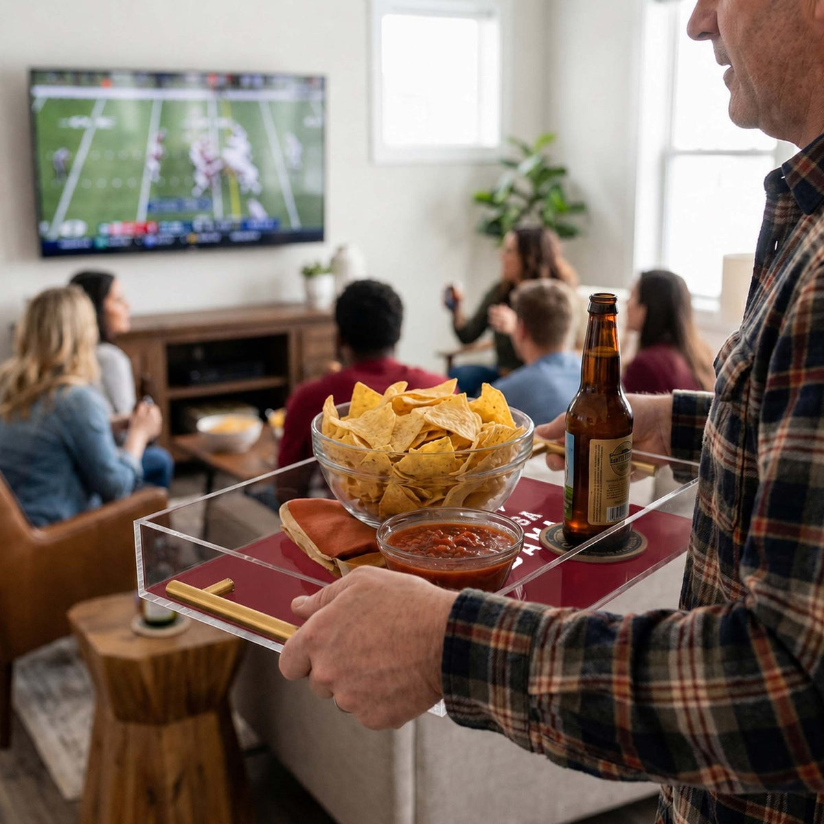 custom college football acrylic serving tray used at a party watch indoors